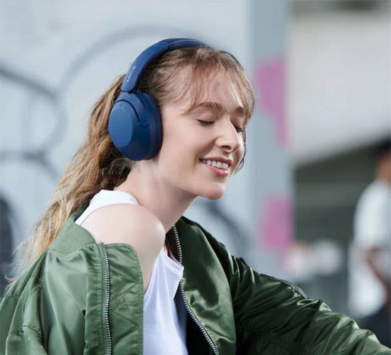 Female enjoying her headphones